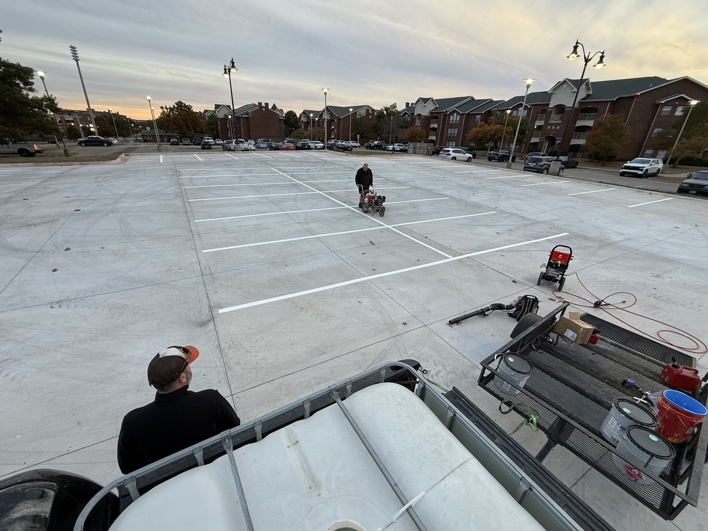 Freshly painted parking-stall layout on new concrete at Oklahoma State University, Stillwater